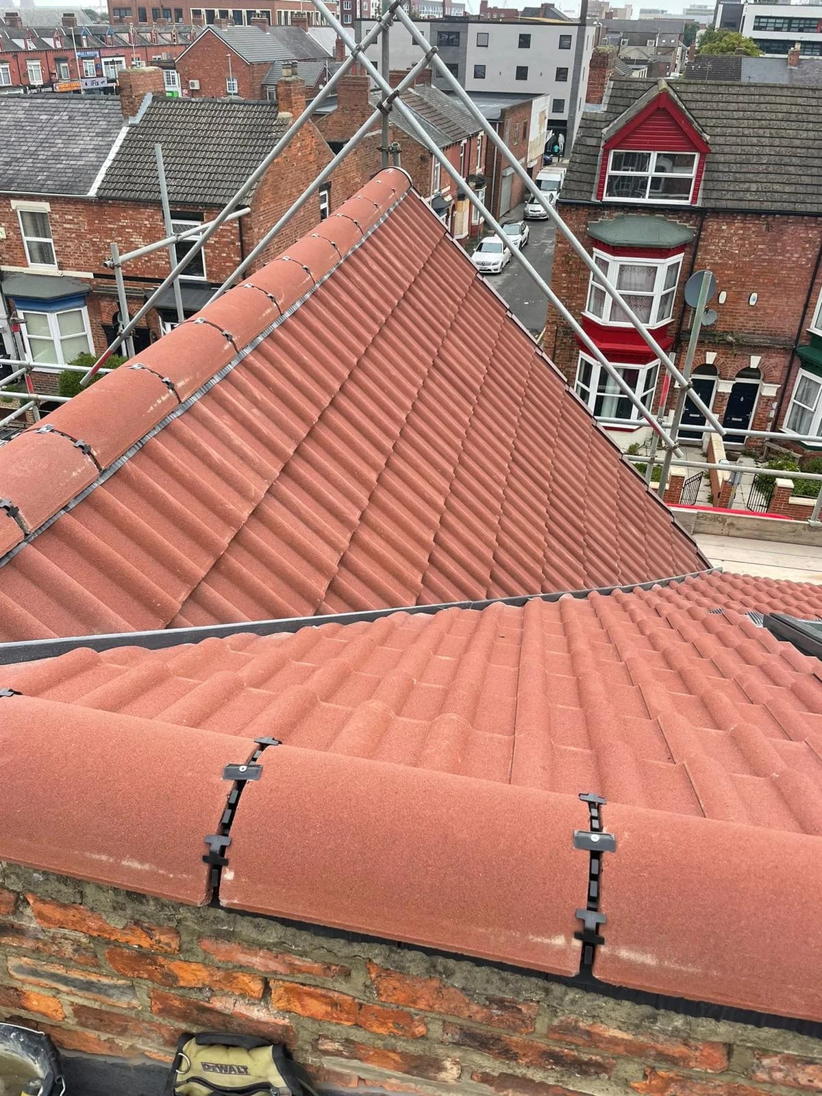 Repaired red-tiled terraced roof in County Durham